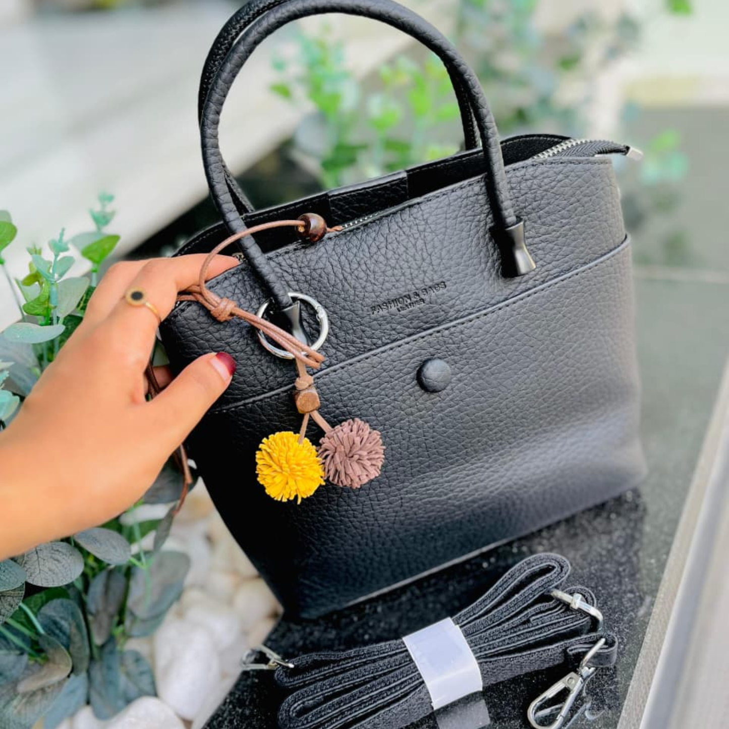 Elegant Black Textured Handbag with Sling